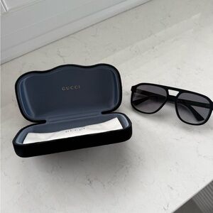 Gucci Dark Sunglasses with Elegant Case